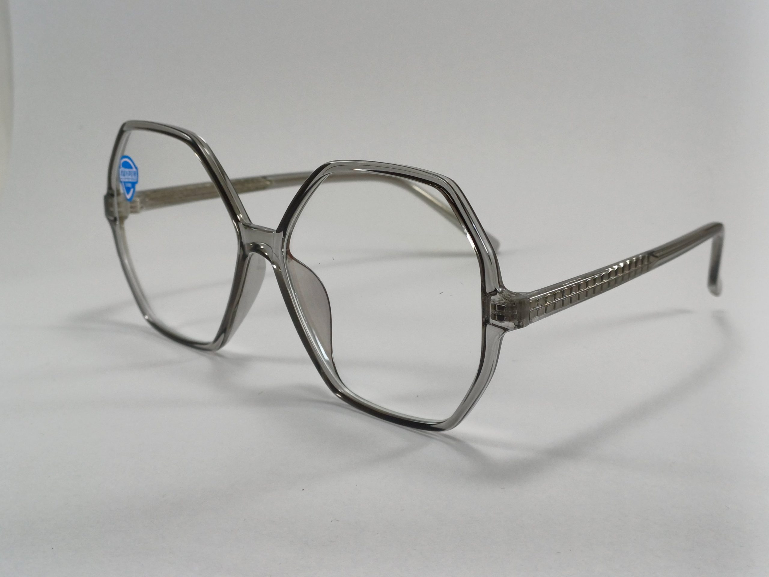 عینک بلوکات چند ضلعی مخصوص مطالعه و کامپیوتر رنگ دودی با جلد و دستمال عینک بلوکات چند ضلعی مخصوص مطالعه و کامپیوتر رنگ دودی با جلد و دستمال