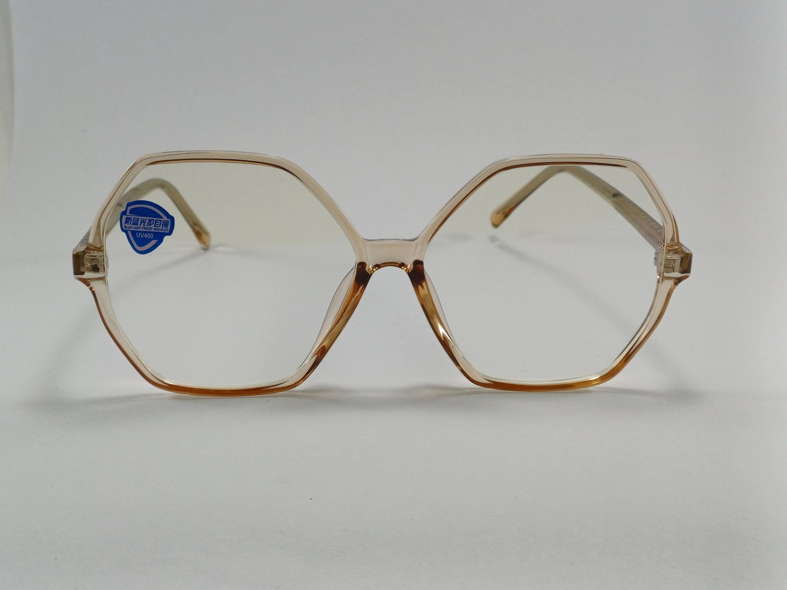 عینک بلوکات چند ضلعی مخصوص مطالعه و کامپیوتر رنگ جدید قهوه ای آبنباتی با جلد و دستمال عینک بلوکات چند ضلعی مخصوص مطالعه و کامپیوتر رنگ جدید قهوه ای آبنباتی با جلد و دستمال