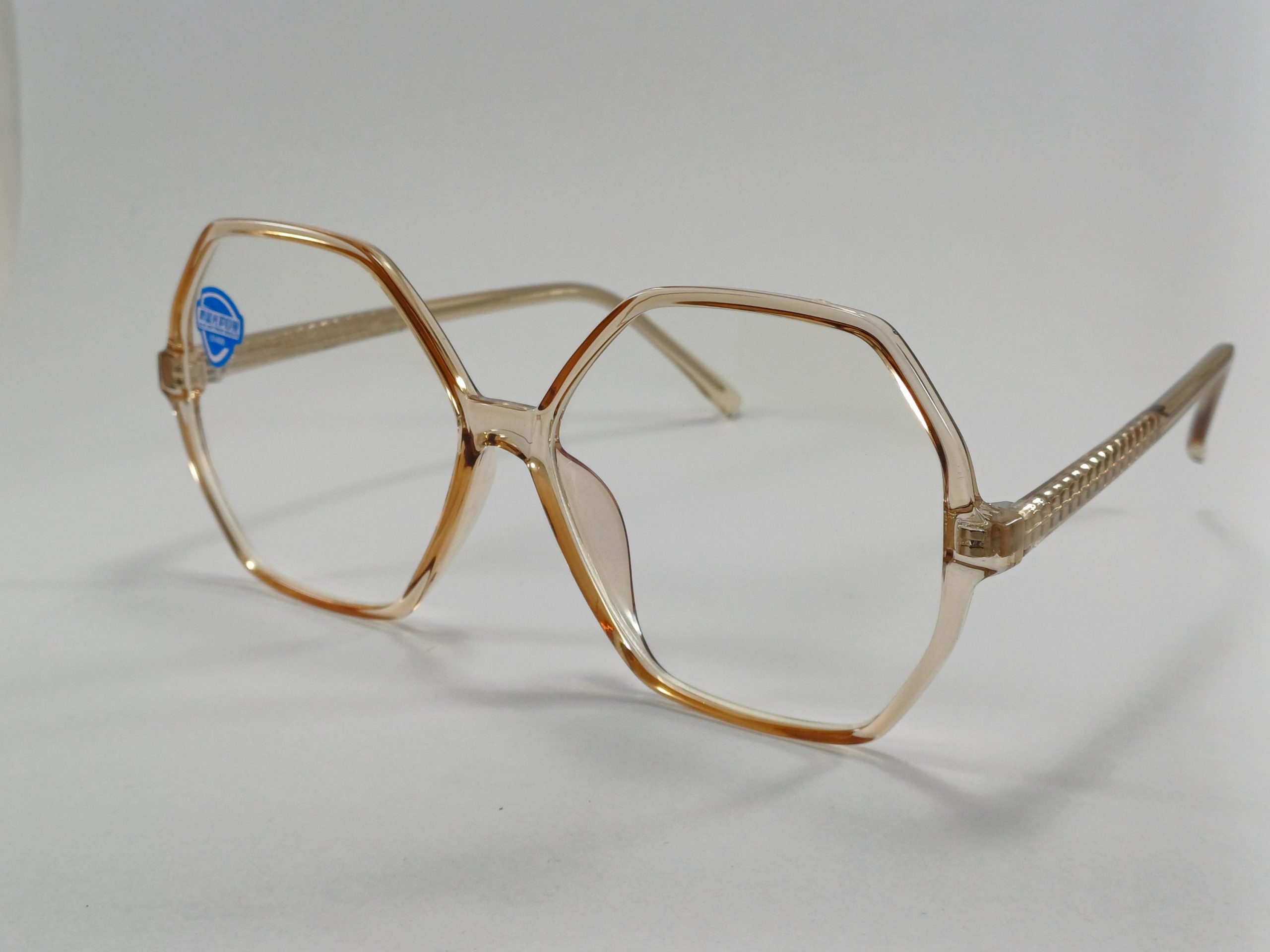 عینک بلوکات چند ضلعی مخصوص مطالعه و کامپیوتر رنگ جدید قهوه ای آبنباتی با جلد و دستمال عینک بلوکات چند ضلعی مخصوص مطالعه و کامپیوتر رنگ جدید قهوه ای آبنباتی با جلد و دستمال