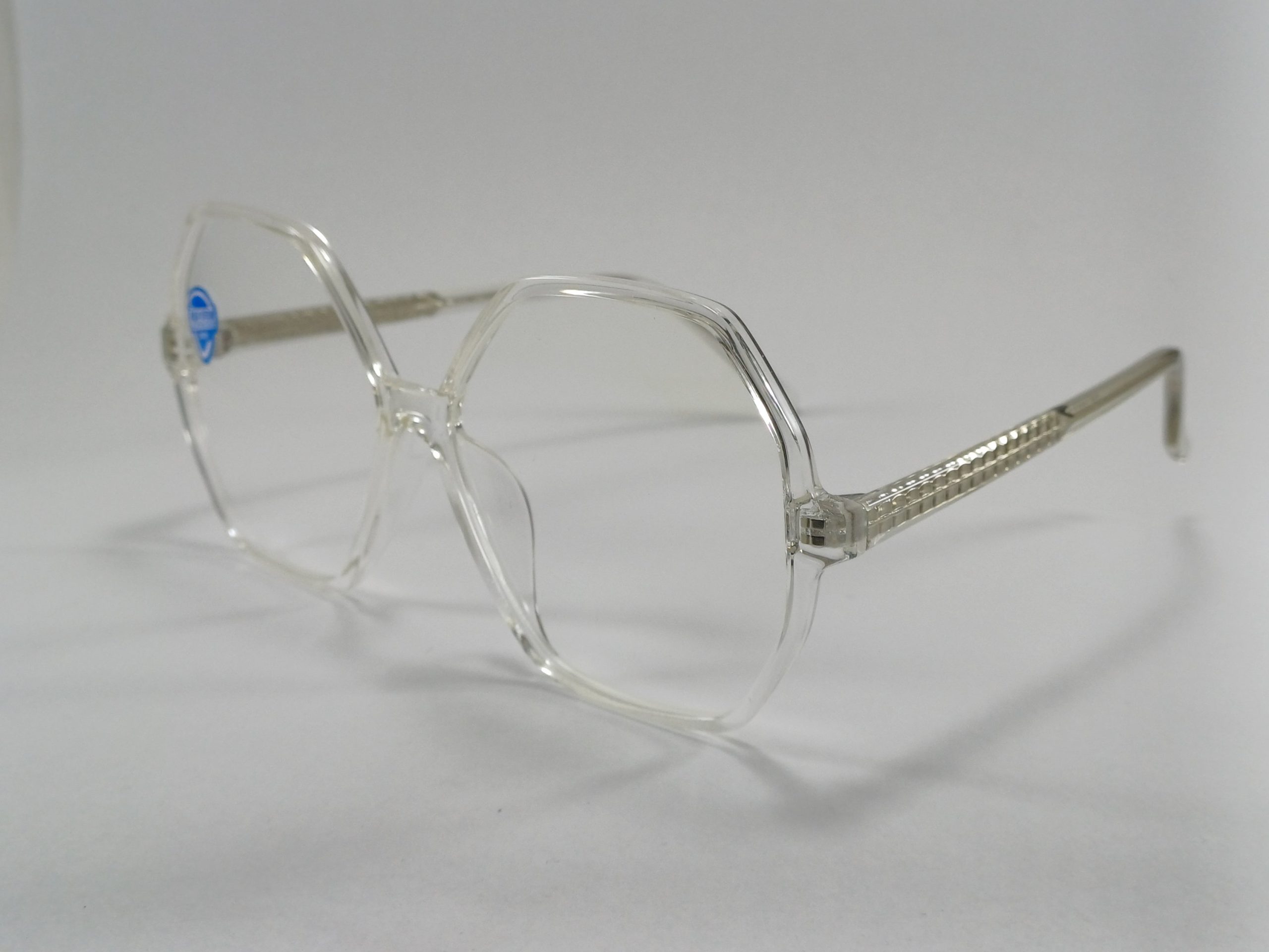 عینک بلوکات چند ضلعی مخصوص مطالعه و کامپیوتر رنگ شفاف با جلد و دستمال عینک بلوکات چند ضلعی مخصوص مطالعه و کامپیوتر رنگ شفاف با جلد و دستمال