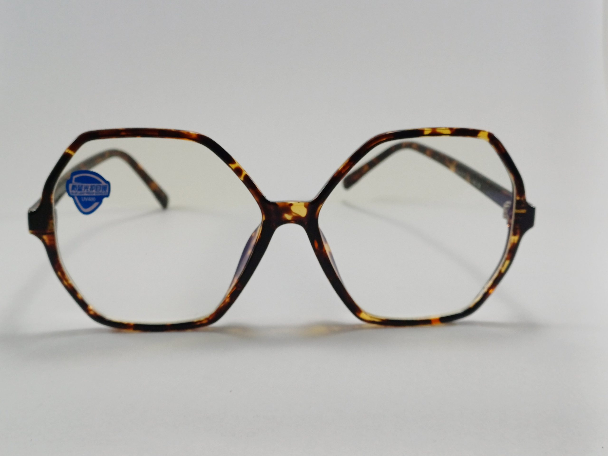 عینک بلوکات چند ضلعی مخصوص مطالعه و کامپیوتر رنگ تایگر قهوه ای با جلد و دستمال عینک بلوکات چند ضلعی مخصوص مطالعه و کامپیوتر رنگ تایگر قهوه ای با جلد و دستمال